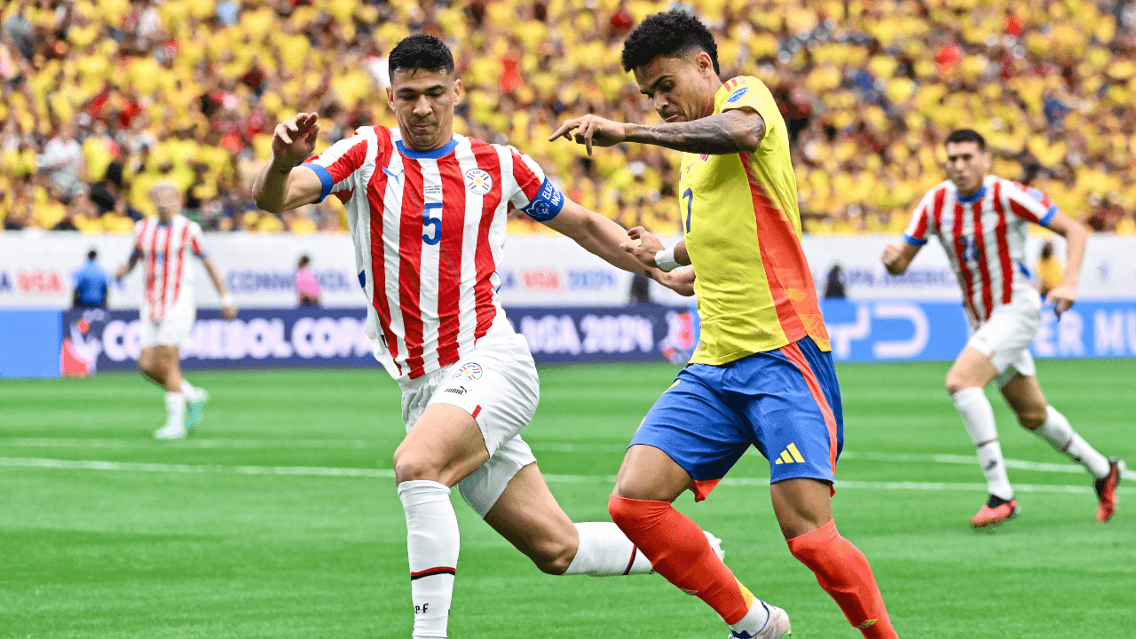 photologuephotos2025-06luis_diaz_regatea_ante_un_defensor_paraguayo_en_la_copa_america_2024png