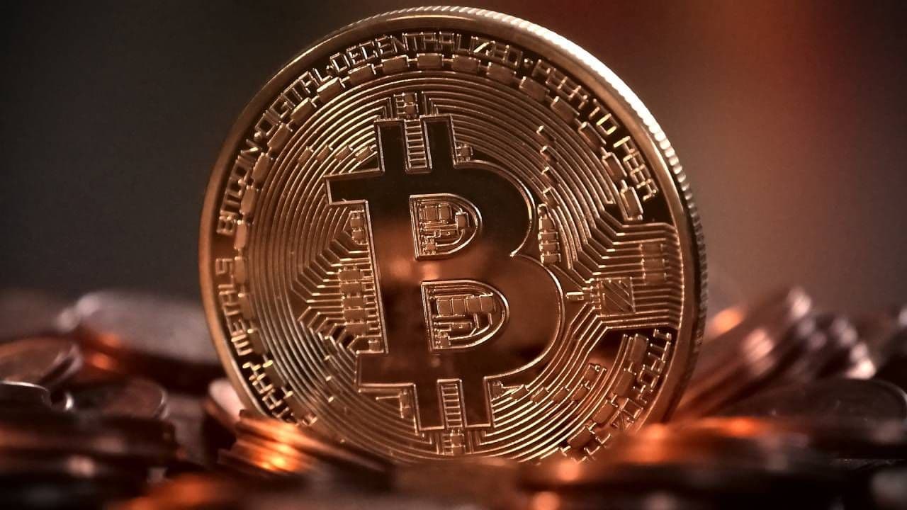photologuephotos2024-12bitcoin_100000_dolaresjpg