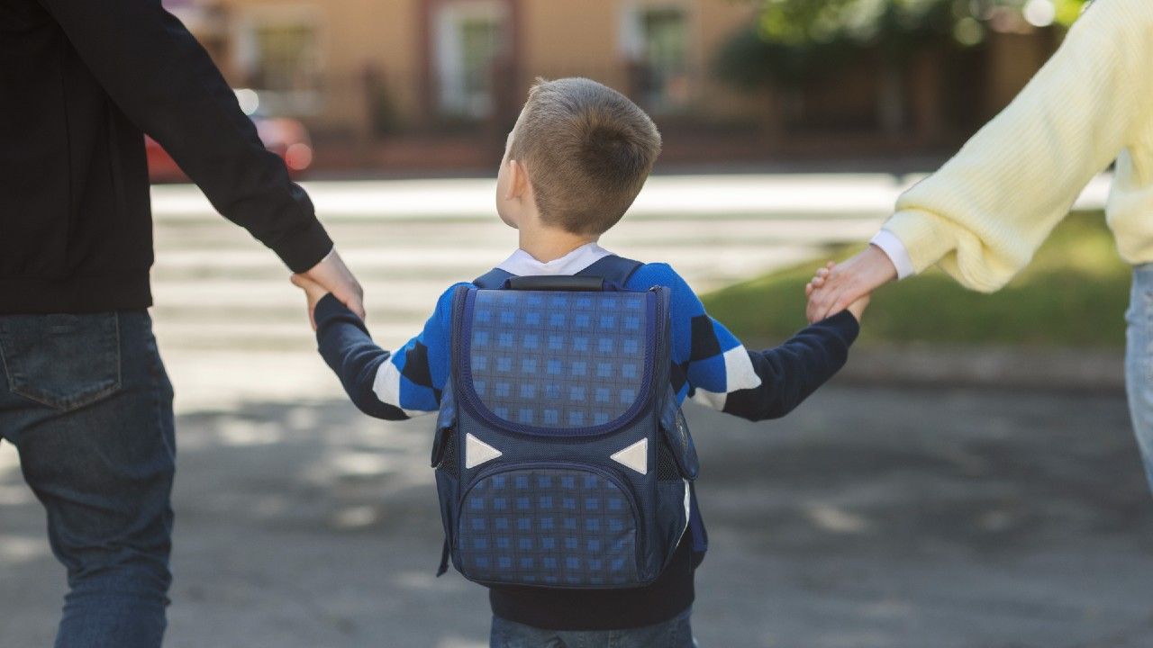parents-kid-first-school-day-back-view.jpg