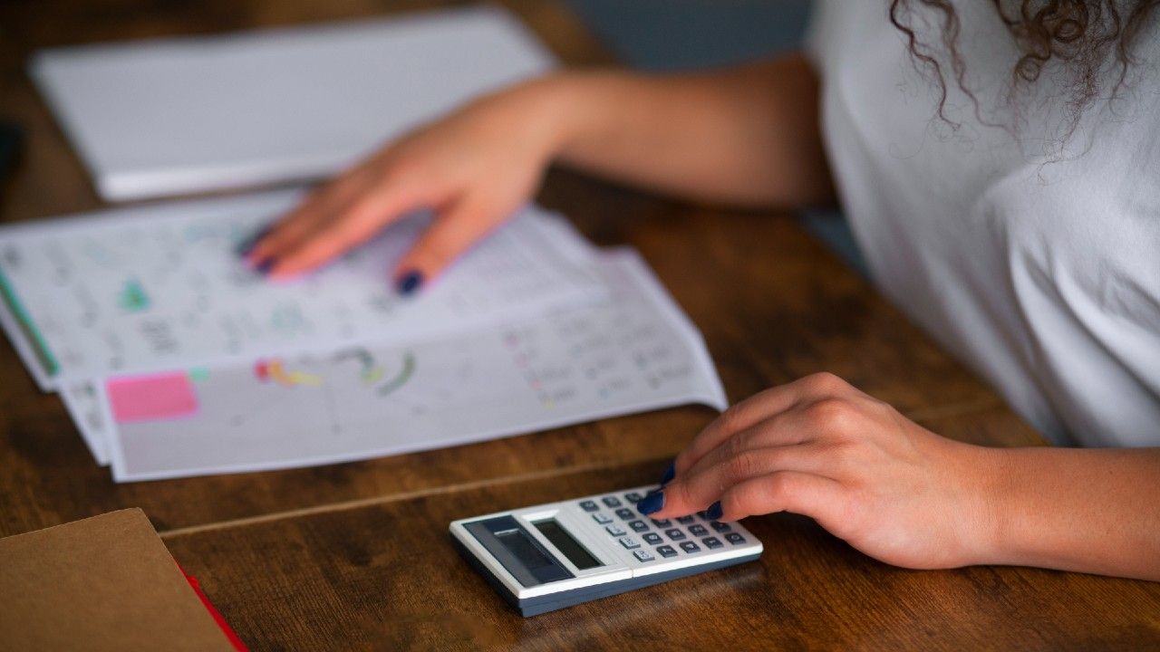 side-view-woman-working-as-economist.jpg