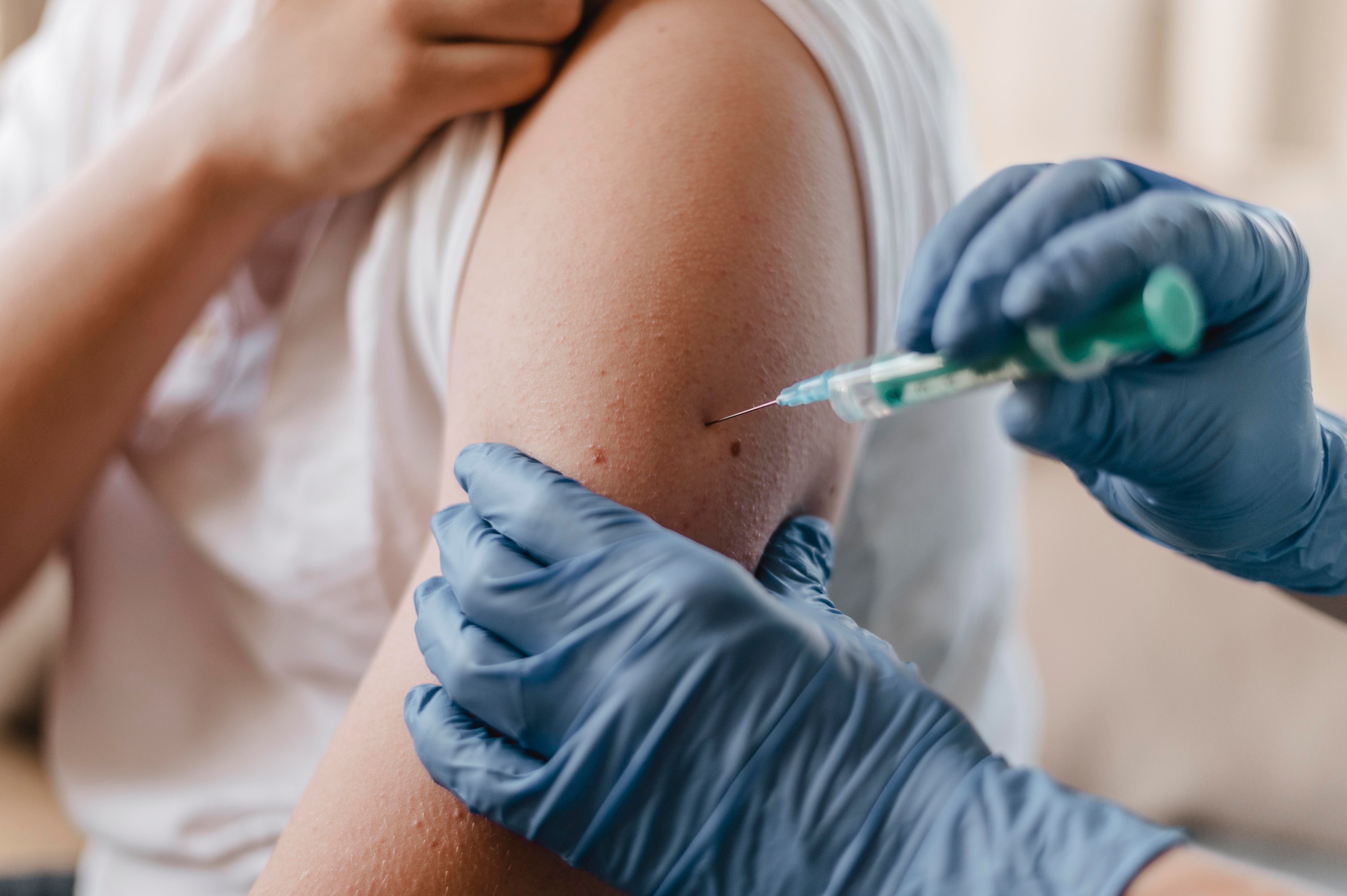 doctor-giving-child-vaccine-while-wearing-gloves.jpg