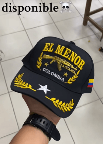 El menor, gorra armada