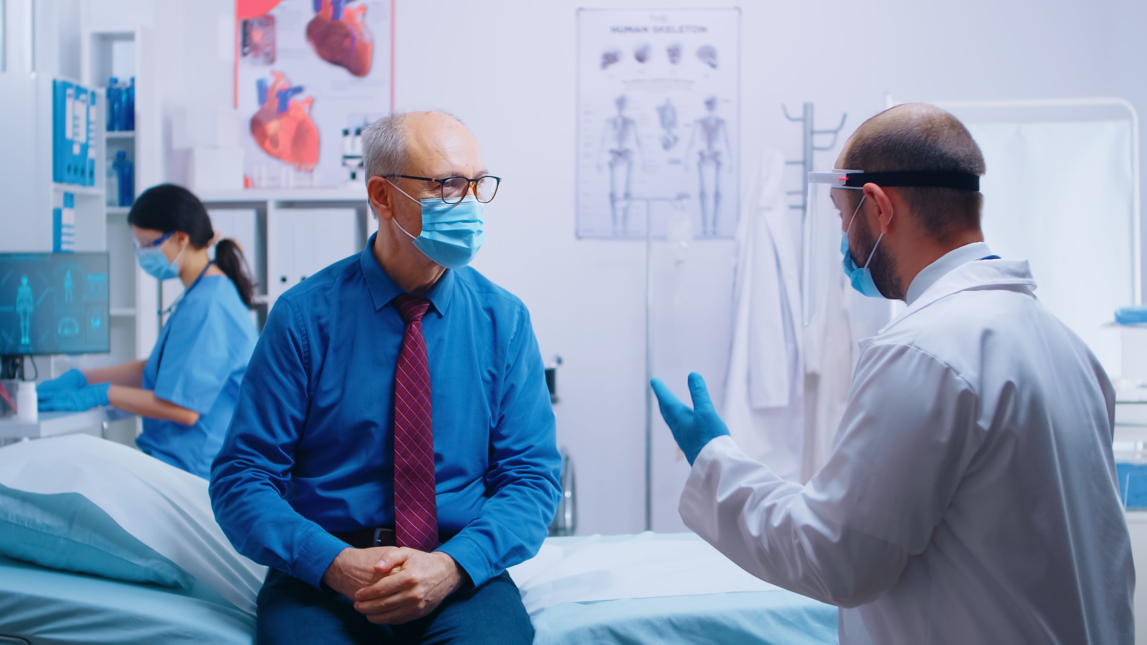 senior-man-doctor-appointment-covid-19-pandemic-patient-wearing-mask-doctor-protective-wear-healthcare-consultation-medicinal-system-private-modern-clinic.jpg