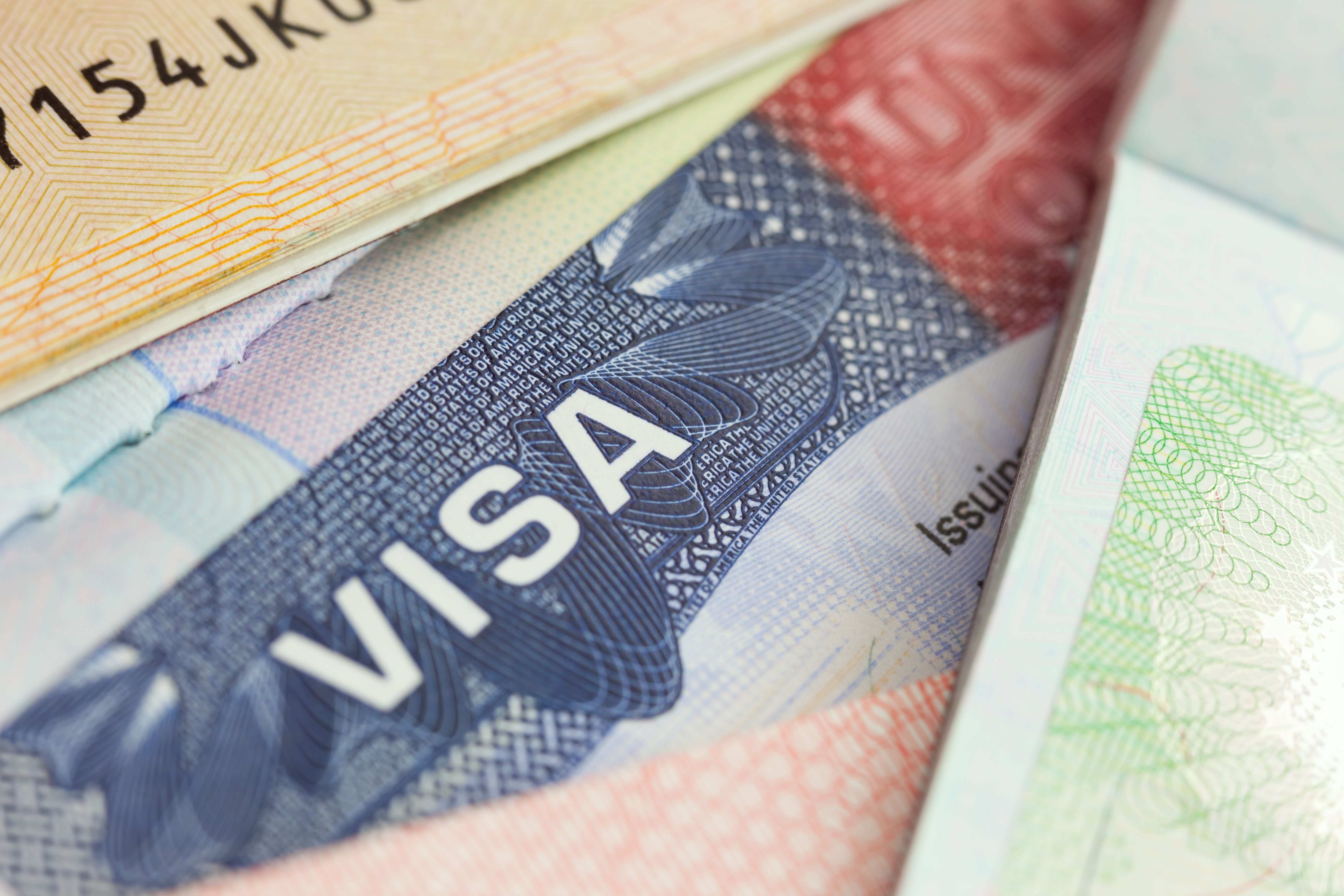 usa-visa-passport-selective-focus-background.jpg