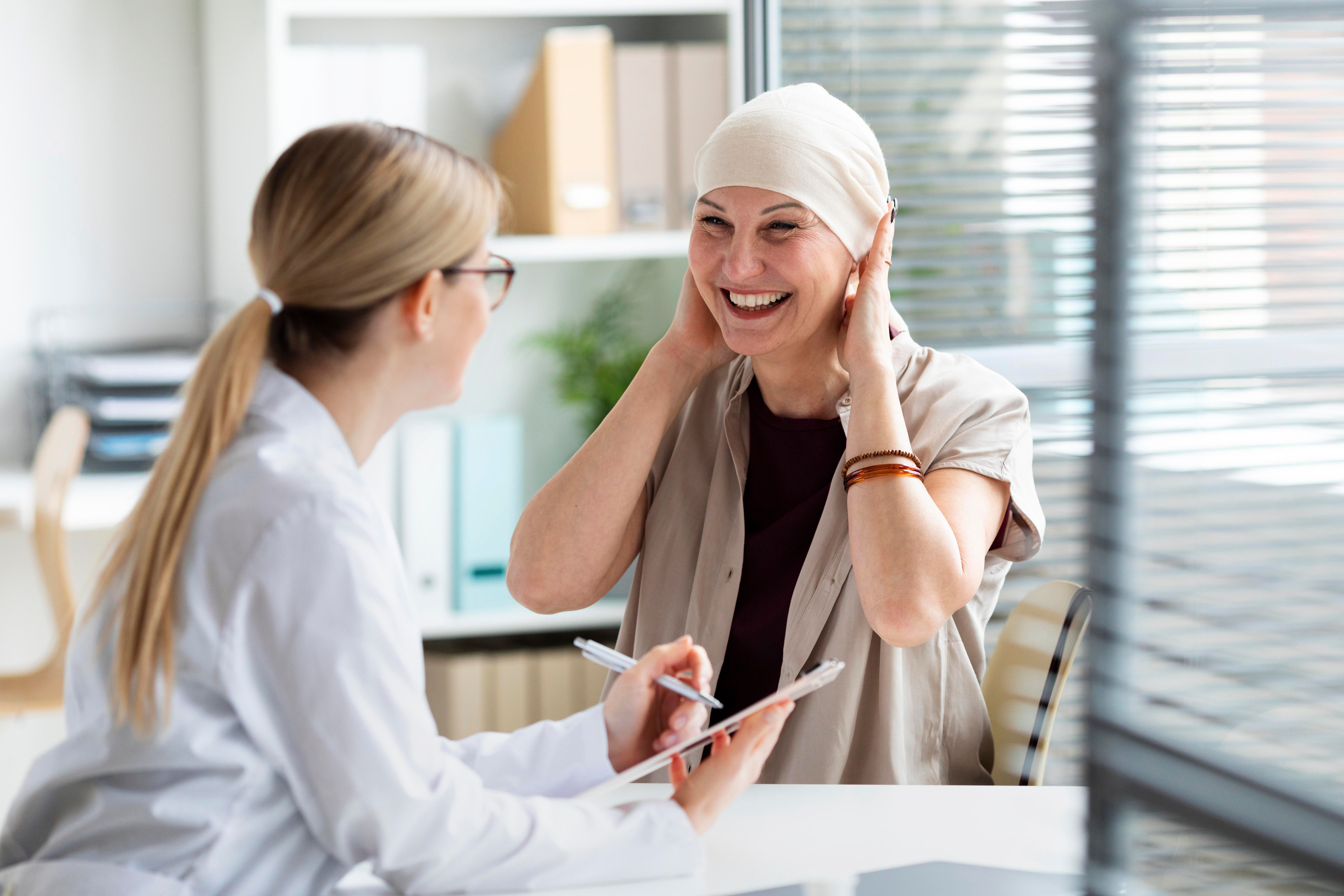 woman-with-skin-cancer-talking-with-doctor.jpg